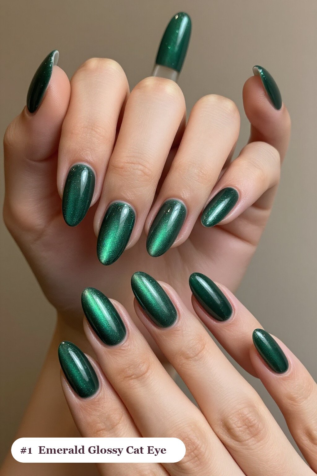 Emerald Almond Cat Eye Nails with Gem‑Like Magnetic Band - winter nails cat eye
