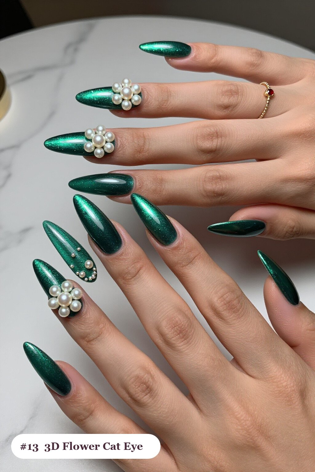 Emerald Stiletto Cat Eye Nails Featuring 3D Pearl Flowers - winter nails cat eye