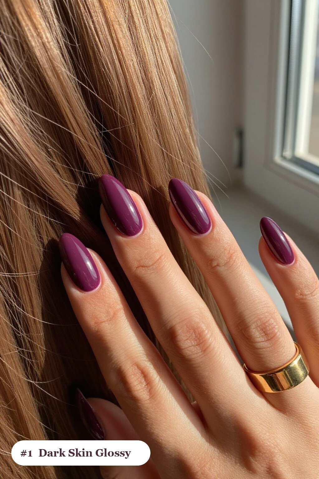Long ballerina plum dark skin nails in a flawless mirror-glossy full-colour finish, perfect for winter - winter nails for dark skin