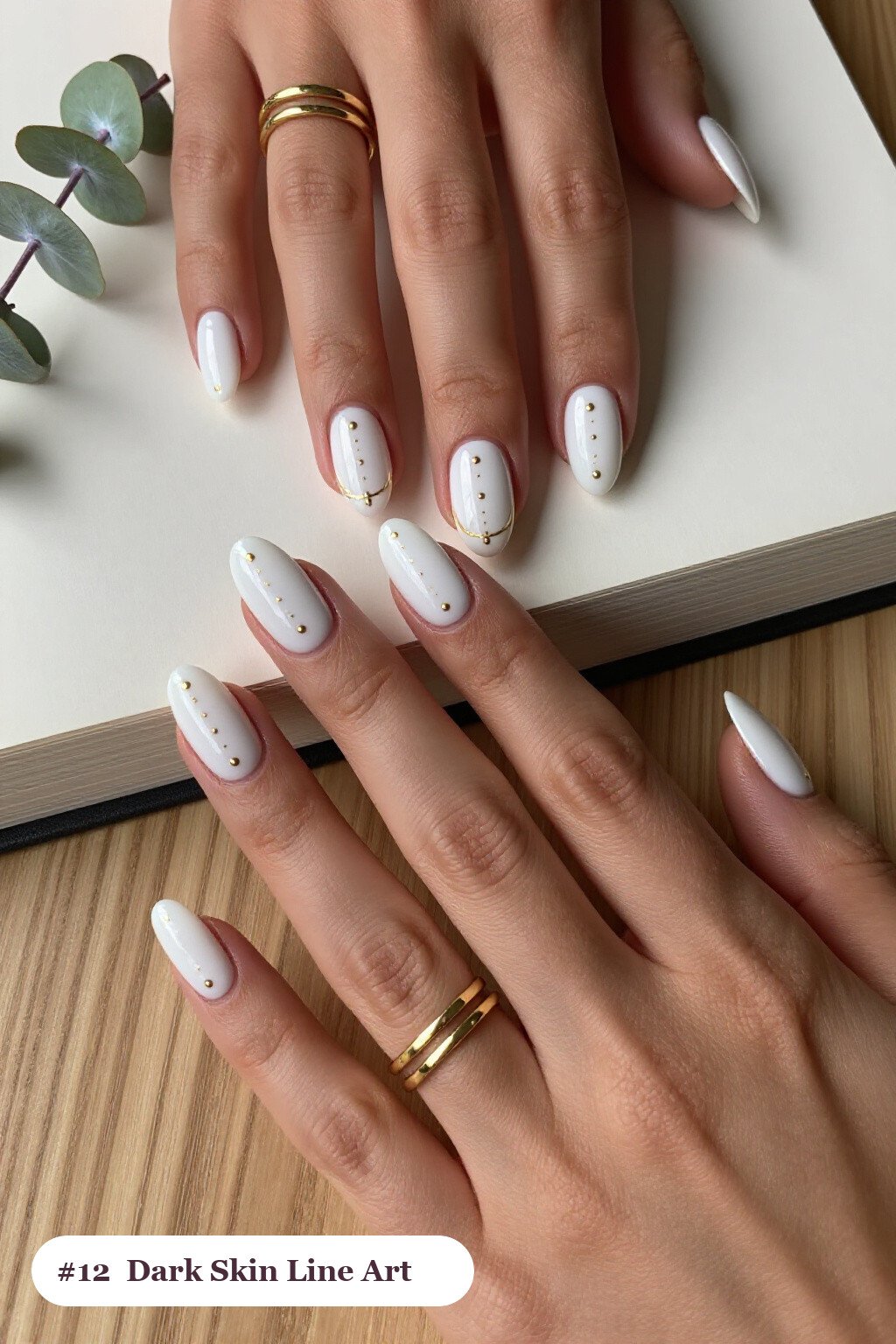 Medium square snow white dark skin nails with fine gold line art and tiny dots drawn across every nail, perfect for winter - winter nails for dark skin