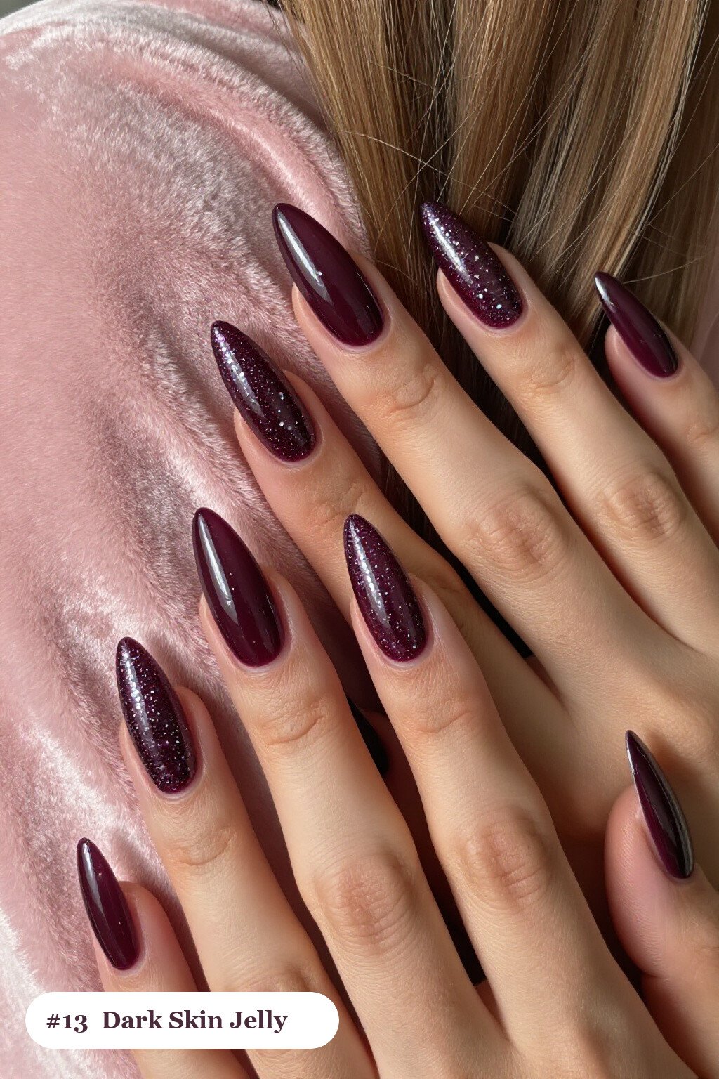 Long stiletto plum dark skin nails in a see-through jelly finish with encapsulated glitter, perfect for winter - winter nails for dark skin