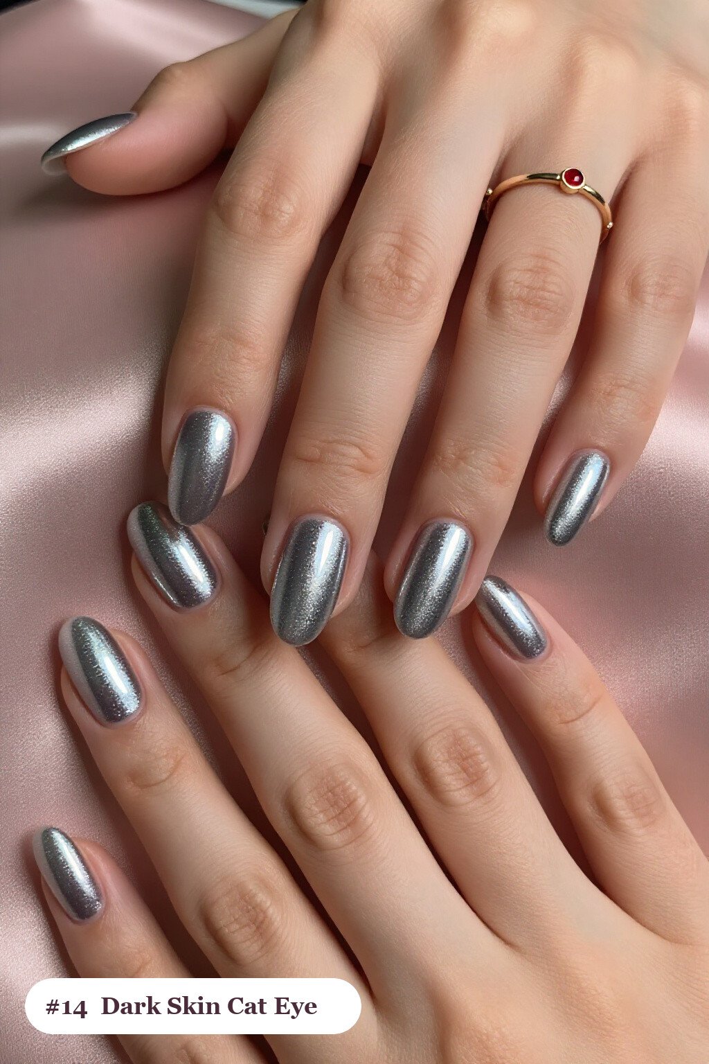Medium coffin silver dark skin nails with a glowing shimmer band of light running down the centre of each nail like a gemstone, perfect for winter - winter nails for dark skin