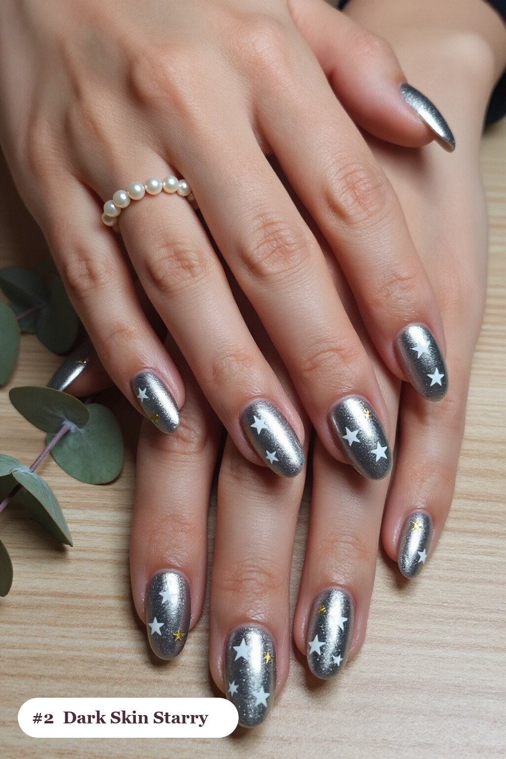 Medium square silver dark skin nails with white and gold stars and sparkles painted on every nail, perfect for winter - winter nails for dark skin