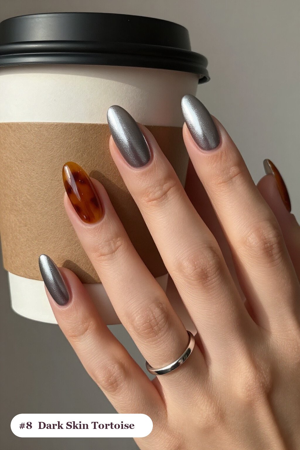Long coffin silver dark skin nails with glossy amber tortoiseshell on two accent nails, perfect for winter - winter nails for dark skin