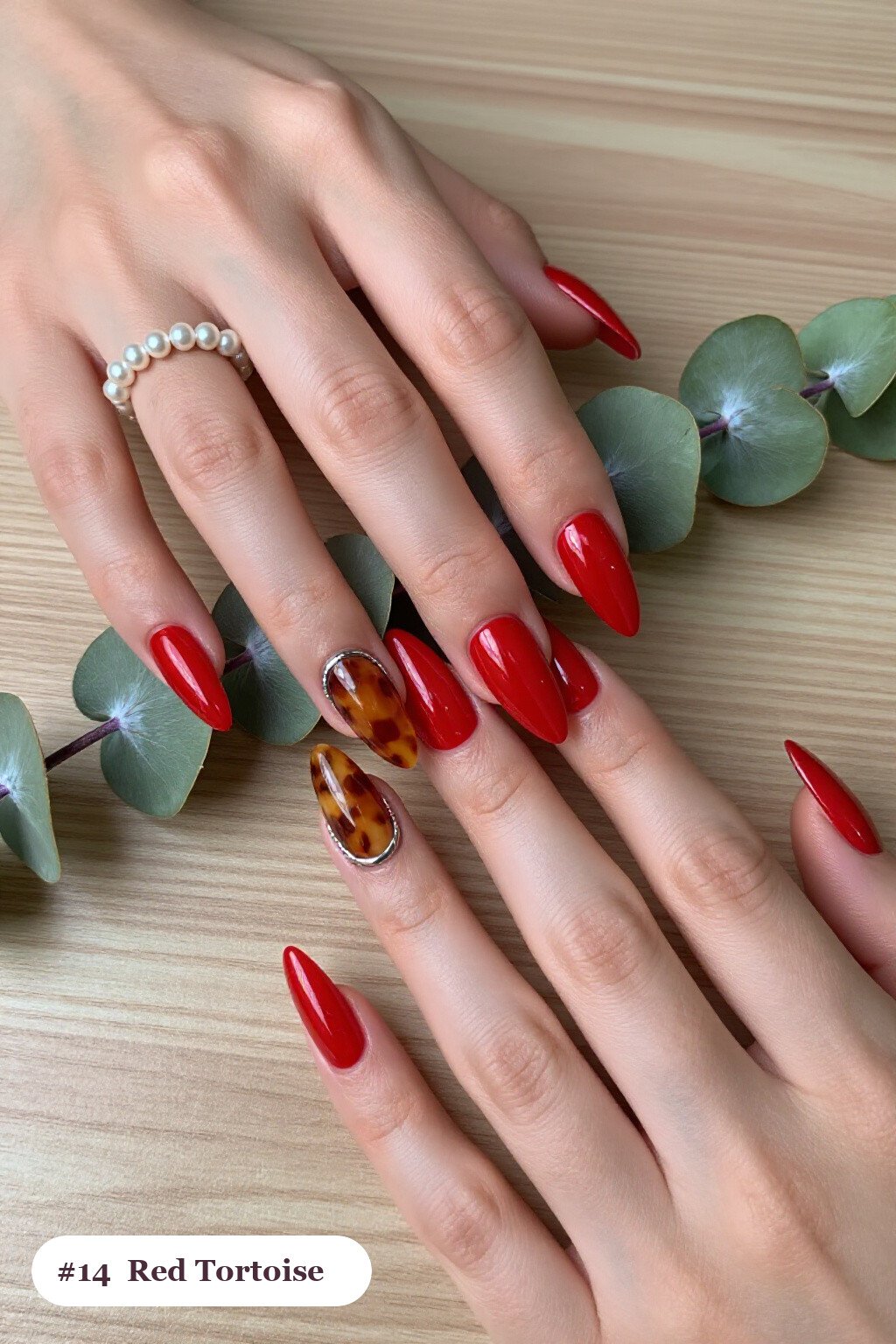 Long Stiletto Red Nails With Amber Tortoiseshell Accents and Silver Chrome Details - winter red nails