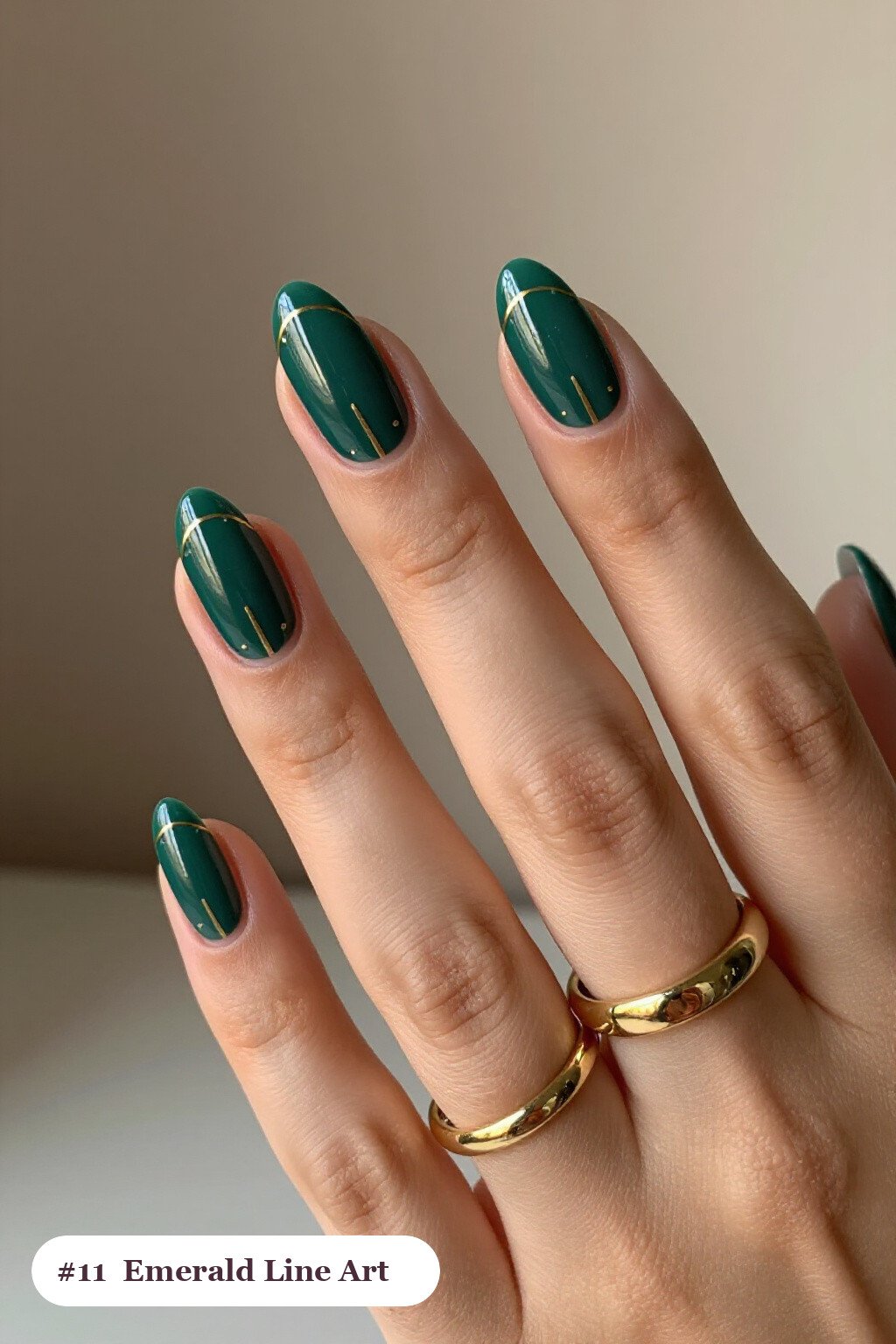 Emerald Short Almond Nails Decorated with Fine Gold Line Art and Tiny Dots - winter short nails Emerald Short Almond Nails Decorated with Fine Gold Line Art and Tiny Dots - winter short nails