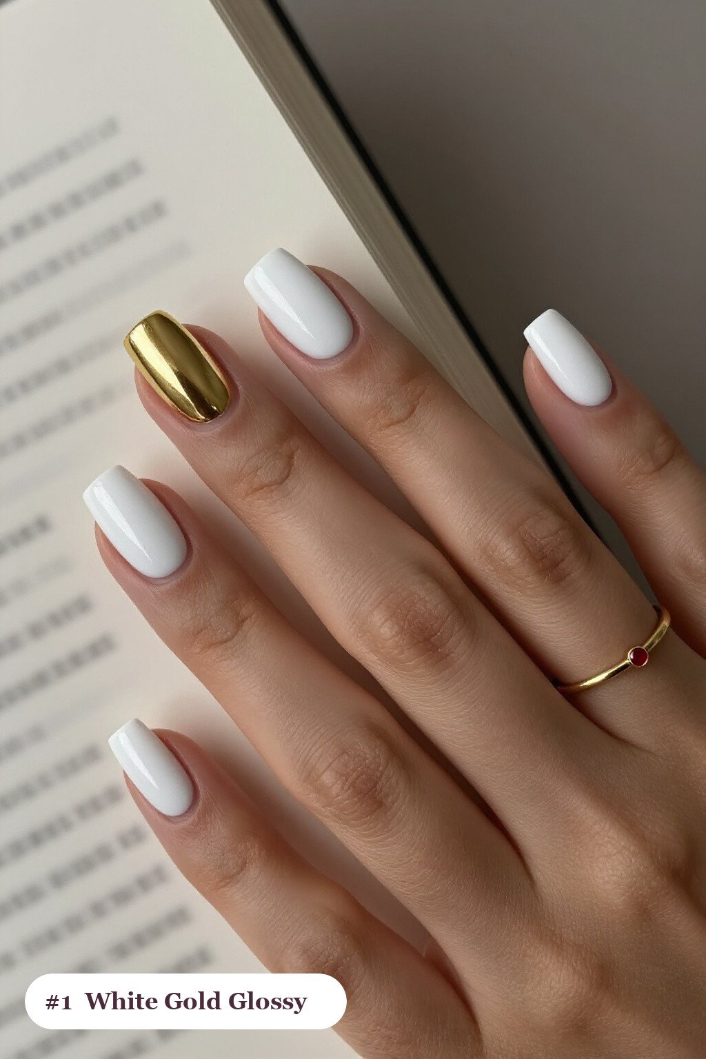 Short square white gold nails in a flawless mirror-glossy full-colour finish, perfect for winter - winter white and gold nails