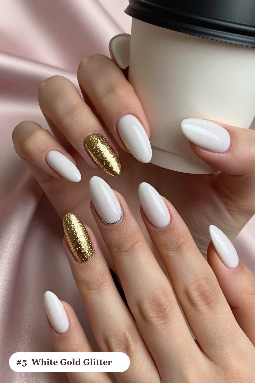 Medium almond white gold nails with a sparkling glitter gradient rising from the cuticle, with silver details, perfect for winter - winter white and gold nails