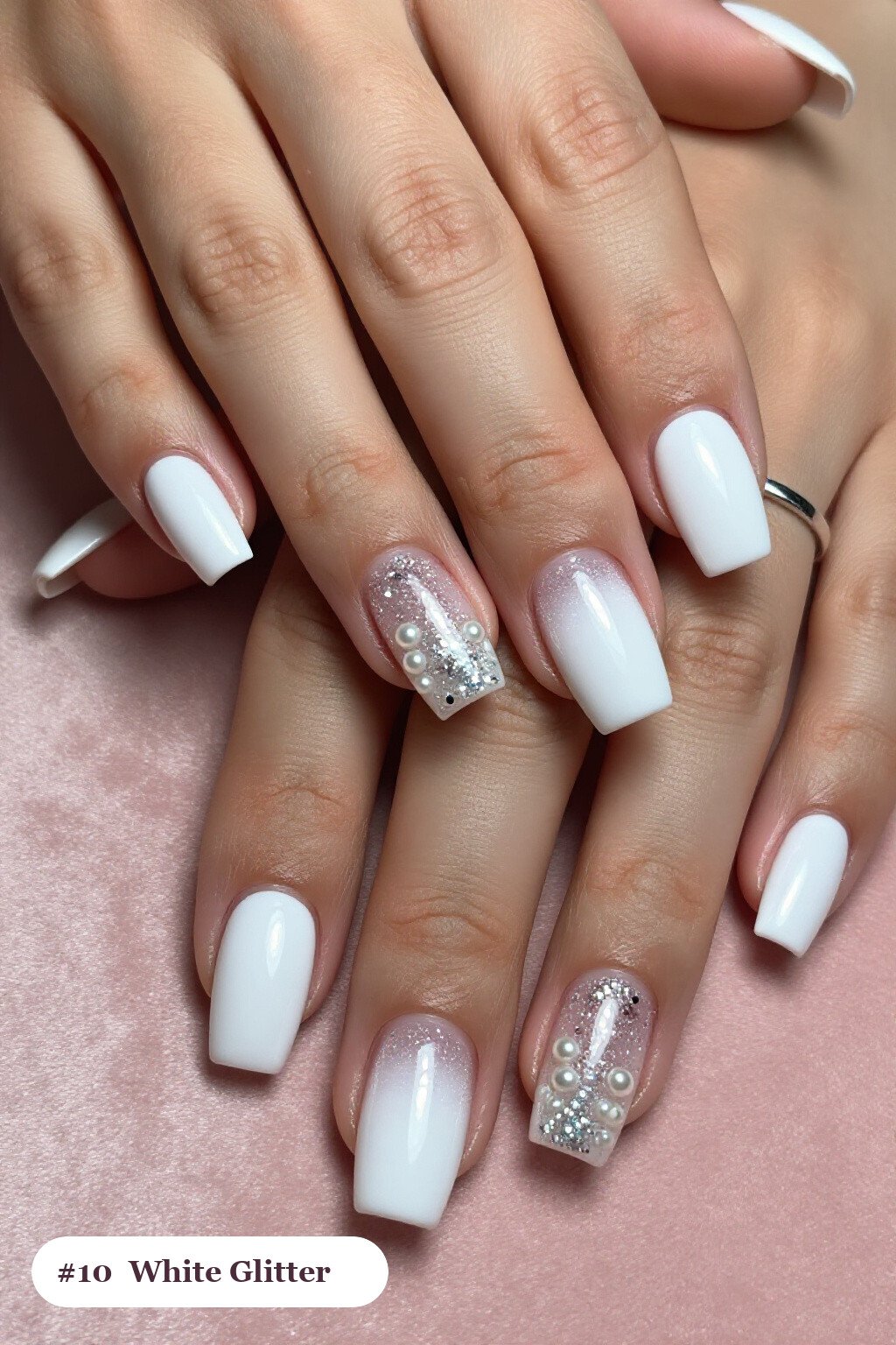 Medium square white nails with a sparkling glitter gradient rising from the cuticle, with pearl details, perfect for winter - winter white nails
