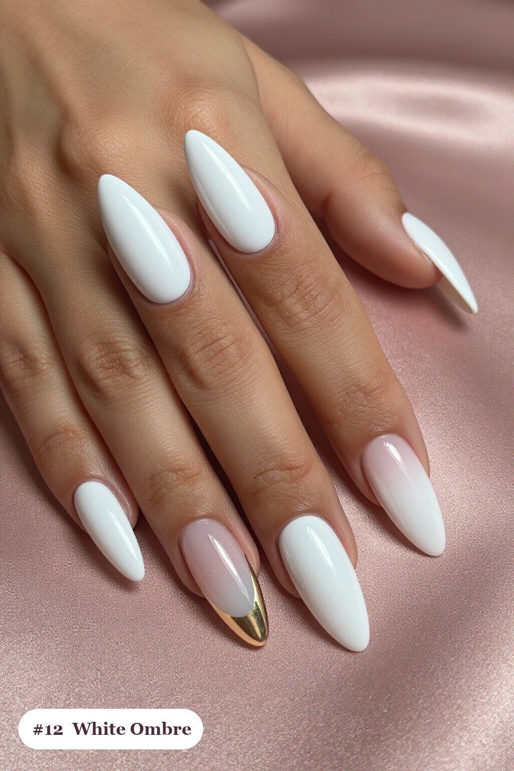 Long stiletto white nails with a vivid two-colour ombre melting from the cuticle to the tips, with champagne details, perfect for winter - winter white nails