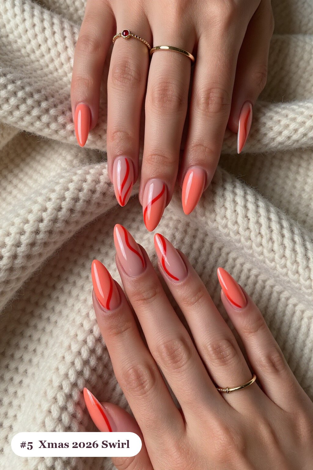 Coral Stiletto Nails Featuring Bold Swirl Lines in Contrasting Color - xmas nail ideas 2026