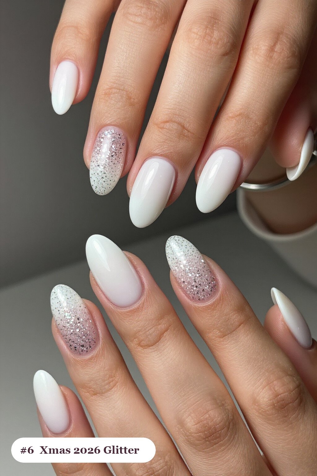 Milky White Oval Nails with a Glitter Gradient from Cuticle Up: How to Make Them Last Longer - xmas nail ideas 2026