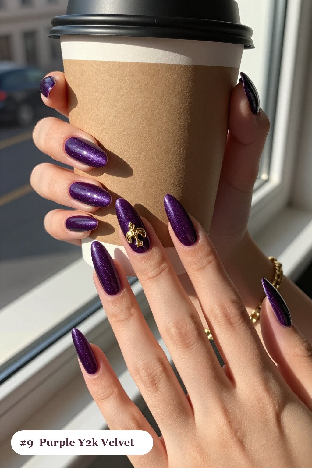 Long ballerina deep purple y2k nails in a velvet shimmer finish with one glossy accent nail with a gold charm, perfect for halloween - y2k halloween nails